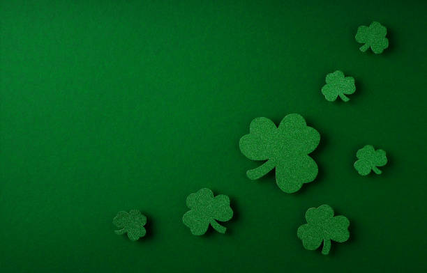 istock Saint Patrick day flat lay concept with shamrock clover on green background 1469995675
