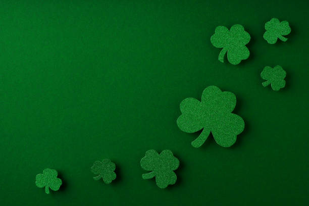istock Saint Patrick day flat lay concept with shamrock clover on green background 1469995710