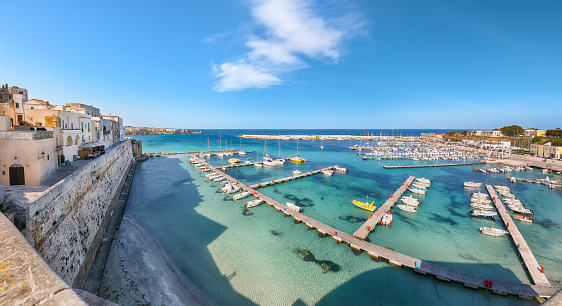 Breathtaking view on harbour of Otranto in Italy with lots of boats and yachts. Italian vacation. Town Otranto, province of Lecce in the Salento peninsula, Puglia, Italy