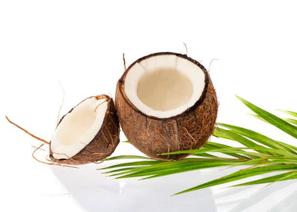 istock Coconut slice. Coco pieces isolated on white. Coconut with leaves. 1469996967
