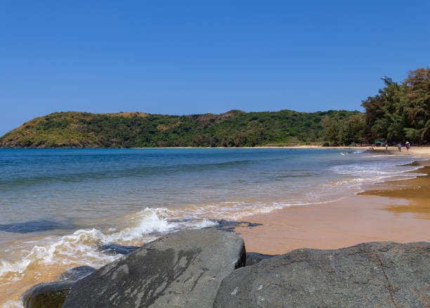 istock Landscape of unspoiled beach with white sand and mountains behind 1469999141
