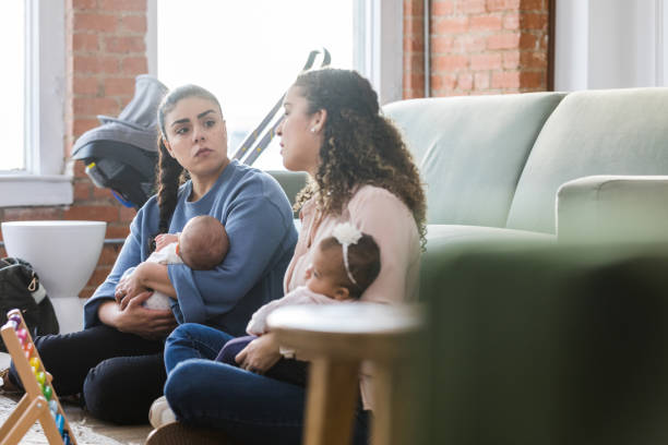 istock Young woman looks at her friend with a concerned expression as she talks about a difficult situation 1469999725