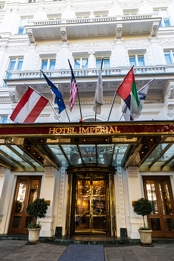 Vienna, Austria - October 17, 2022: Facade and entrance of the Imperial Hotel, a classic building in Innere Stadt, Vienna, Austria