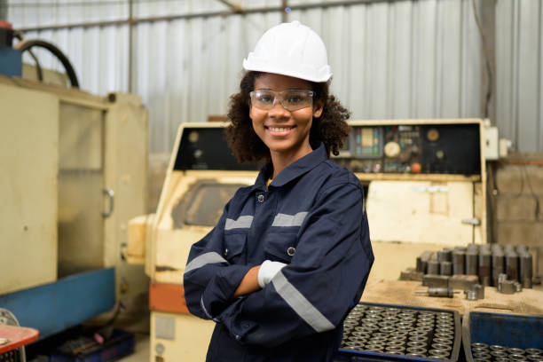 istock Smiling portrait of confident engineer worker at factory 1470001154