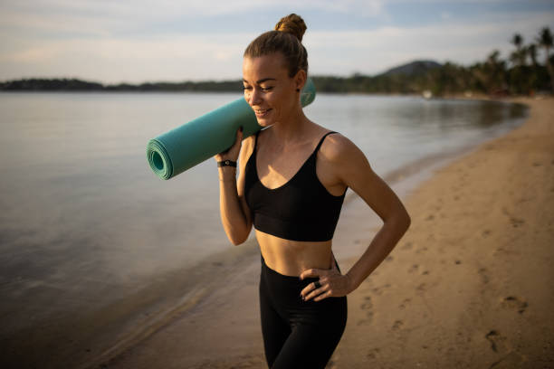 istock Fit woman on the beach 1470001672