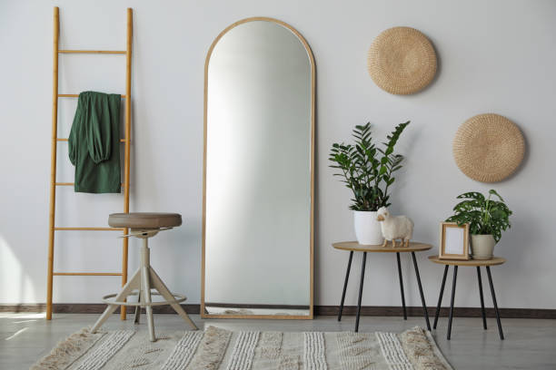 istock Stylish room interior with leaning floor mirror 1470002712