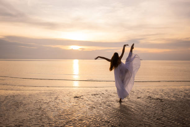 istock Ballerina dancing in sunset 1470002778