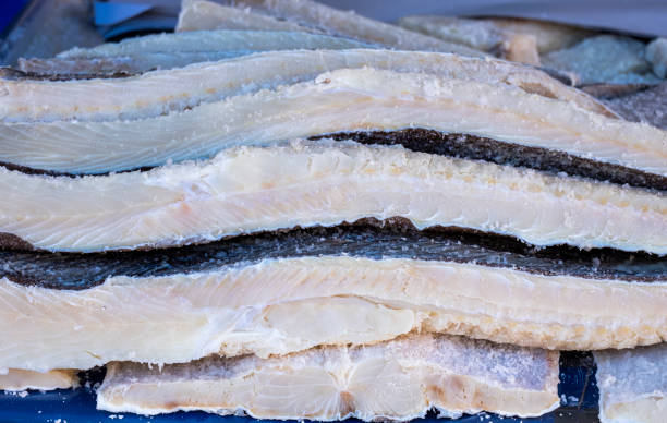 istock Strips of salted cod in a street market. 1470004255