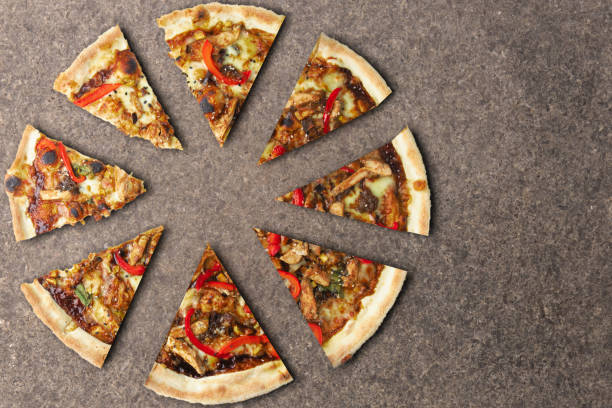 istock BBQ Chicken Pizza Slices with Sauce on Textured Background 1470004544