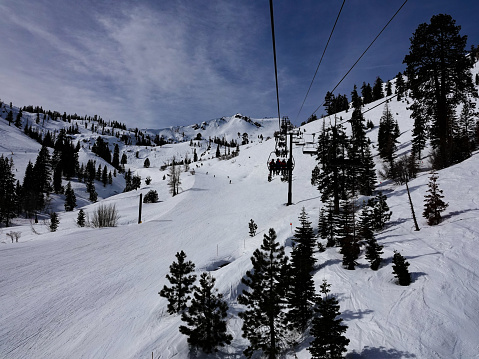Ski lift view of Palisades Tahoe ski resort, California.