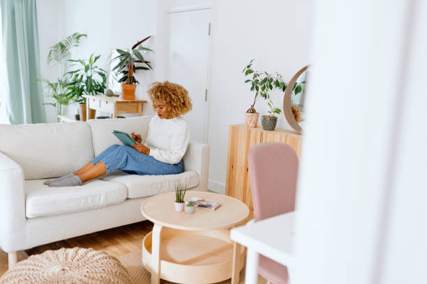 istock Woman relaxing at home 1470007960