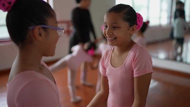 Girls having a conversation at the dance studio