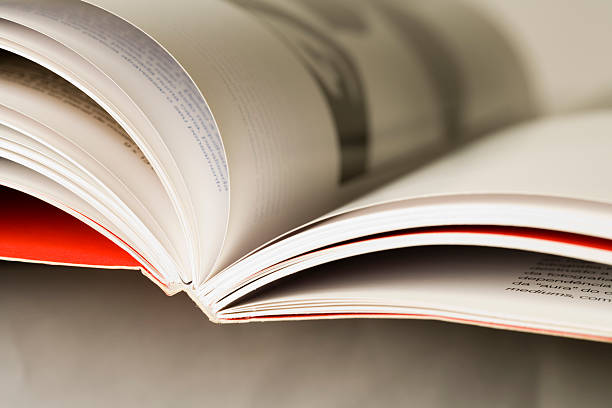 istock A closeup of an open book with a red cover 147001251