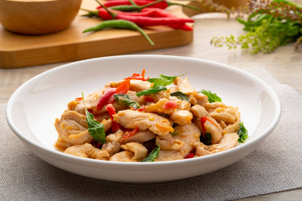 istock Close up Stir-Fried sliced chicken breast with Basil 1470013623