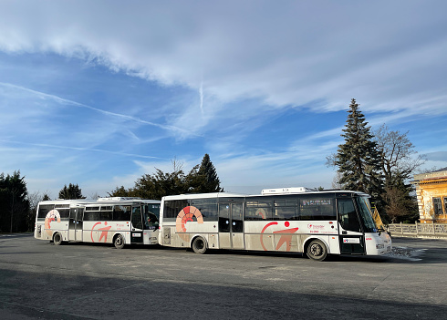 Horní Benešov, Czech Republic - December 29, 2022: Two buses at the bus station.