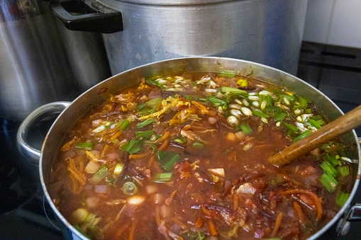 Close up of  a pot of homemade Ukrainian Borscht soup being made to be sold for charity in Polperro, Cornwall.