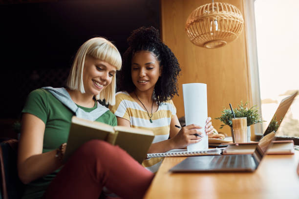 istock Female college students learning for upcoming exams in a cafe. 1470018762