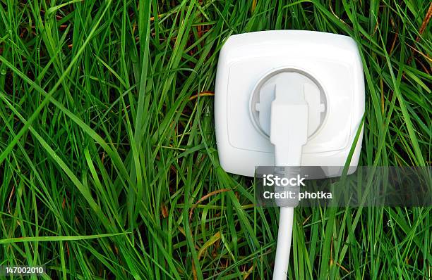 Using Green Energy Stock Photo - Download Image Now - Cable, Electric Plug, Electrical Outlet