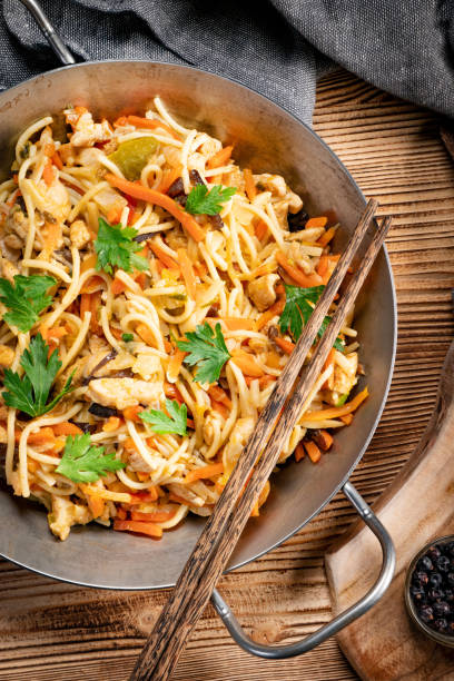 istock Fried noodles with chicken and vegetables. 1470020945