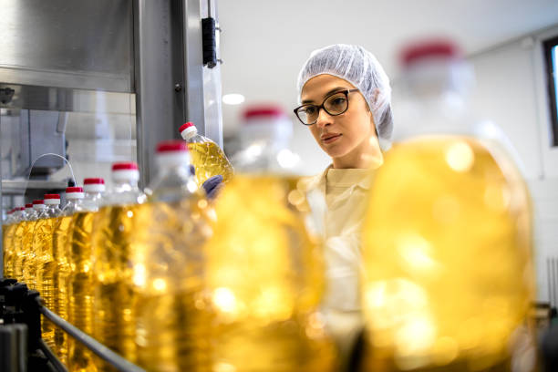 istock Technologist doing quality control in food factory. 1470021545