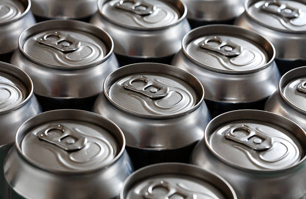 istock Close-up of unopened aluminum can tops 147002156