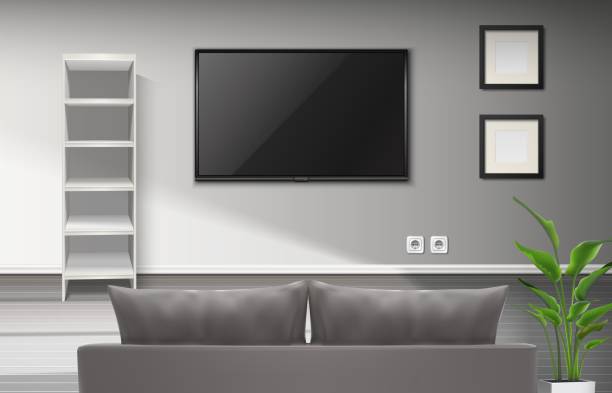 istock 3d realistic vector interior of living room with gray couch and TV screenplay, blank paintings and book shelves . 1470021979