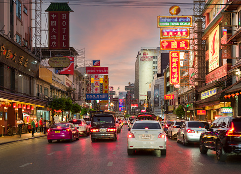 Bangkok, Thailand - December 10, 2022. Evening in Chinatown, Yaowarat. Famous street food place in Bangkok. Entertainment point for travelers at night. The top cultural spot to visit for Thai cuisine.