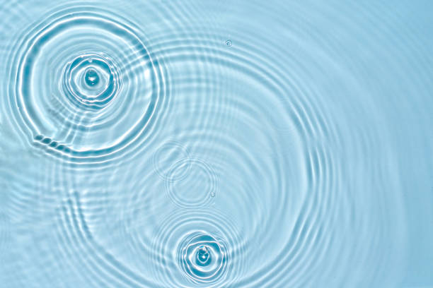 istock Transparent aqua background, blue water texture with wave, ripples, highlights 1470023859