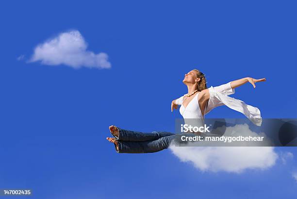 Blonde Woman With Head In The Clouds Stock Photo - Download Image Now - Adult, Adults Only, Arms Outstretched