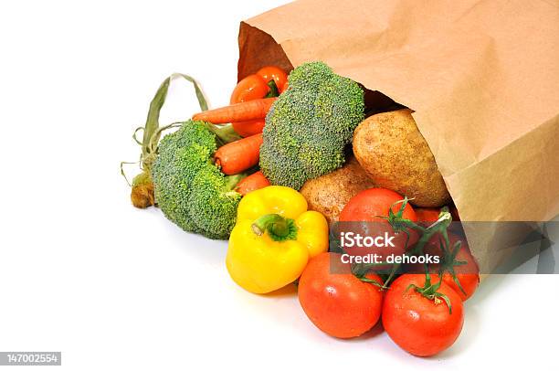 Vegetables In Grocery Bag Stock Photo - Download Image Now - Groceries, Spilling, Bag