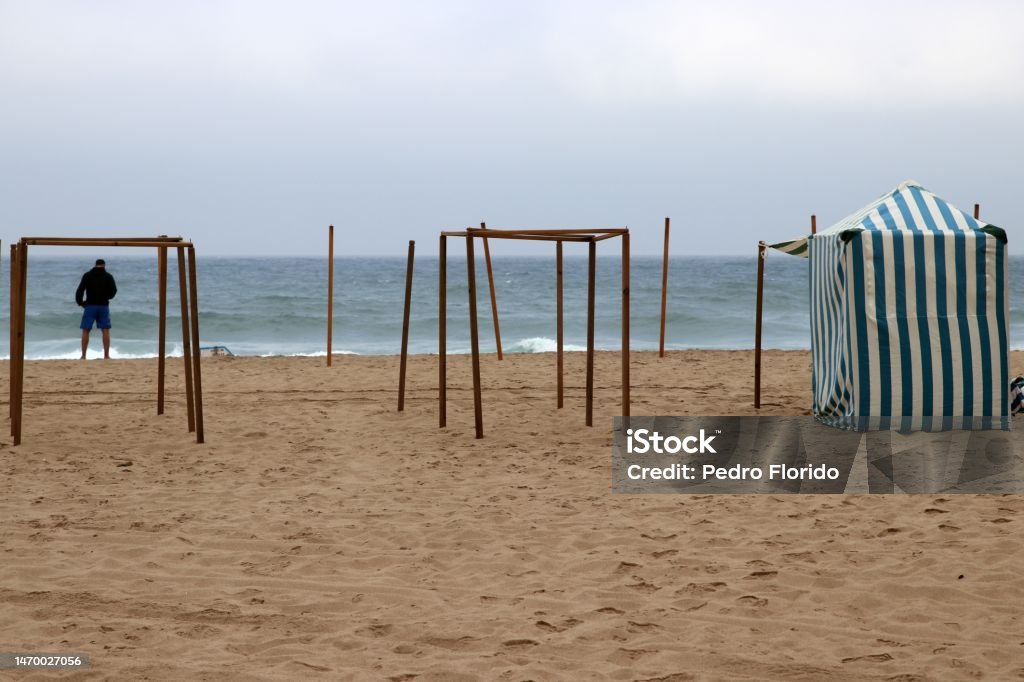 Beach Huts On the beaches of northern Portugal, the tradition of using beach huts has always been strong, mainly as a form of shelter from the north winds. Beach Stock Photo