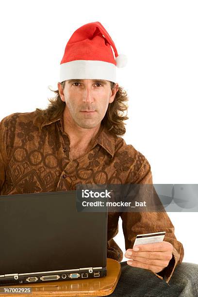 ノートパソコンのクリスマスのオンラインショッピングの中年男性 - 1人のストックフォトや画像を多数ご用意 - 1人, 30代, 30代の男性