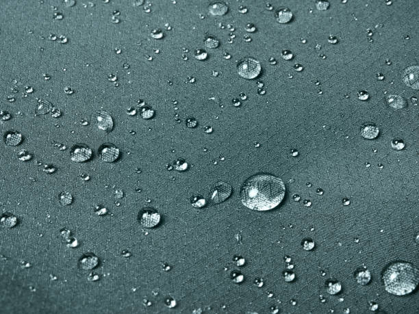 istock Gray technological waterproof and breathable fabric with drops 1470029980