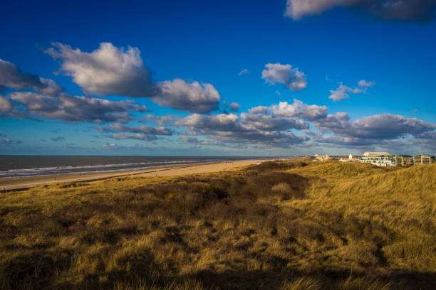 istock View on the Katwijk  from the  dunes in the sunset , 1470029993