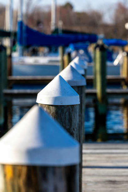 Solomons, Maryland ,USA White- topped pylons in a marina on the Patuxent River.