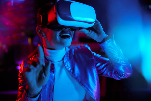 istock smiling modern woman exploring metaverse in modern office 1470031574