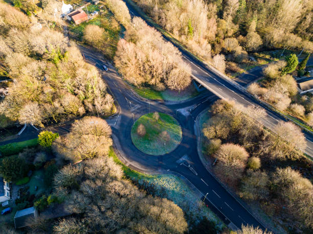 istock Aerial view of a roundabout (traffic circle) in winter 1470033082