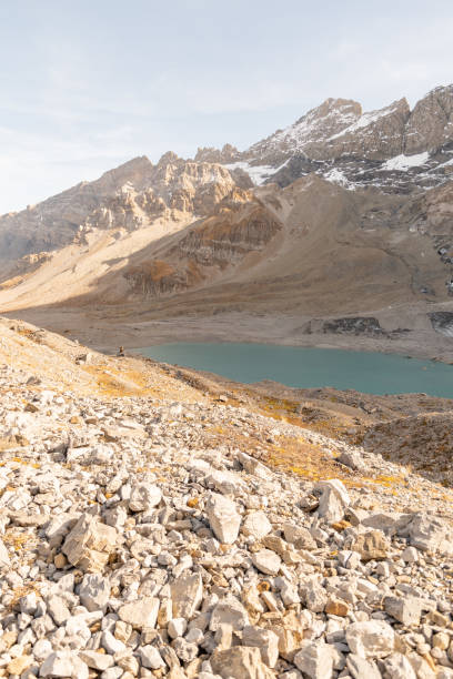 Klausenpass, Uri, Switzerland, October 29, 2022 Small lake surrounded by the swiss alps on a sunny day in autumn