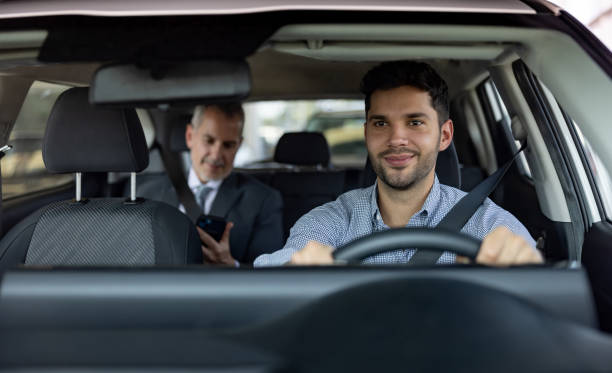 istock Crowdsourced taxi driver transporting a business man 1470035620