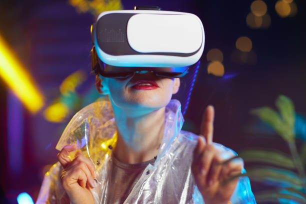 istock trendy female in metaverse pressing button in air 1470038886