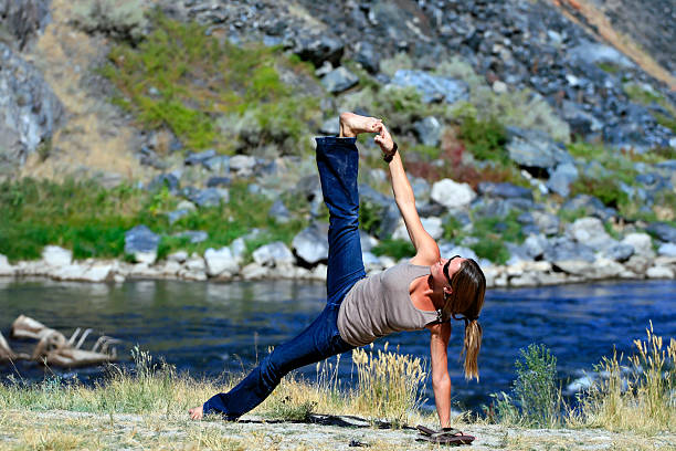 Yoga by the River stock photo