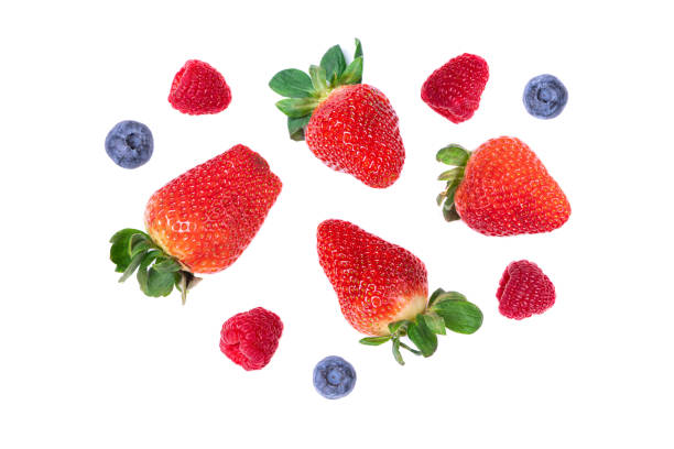 istock Strawberry, raspberry and blueberry on white background, top view. Berries pattern, flat lay. Fresh strawberry, raspberry, bluberry on white background closeup. Creative food 1470041783