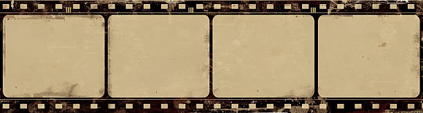 istock A black and yellow grungy looking film frame 147004232