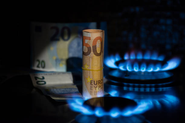 istock A euro bill is on a gas stove with a blue flame. 1470044143
