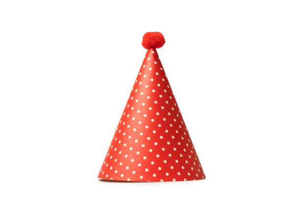istock Bright and colorful birthday cap isolated on a white background. 1470044305
