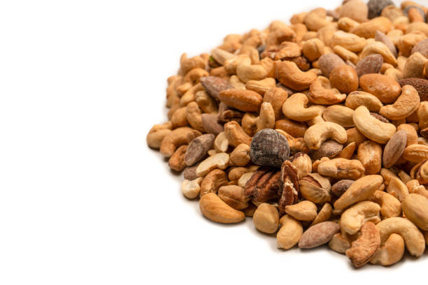 istock A group of almonds, pistachios, walnuts, macadamia, cashews. 1470044325