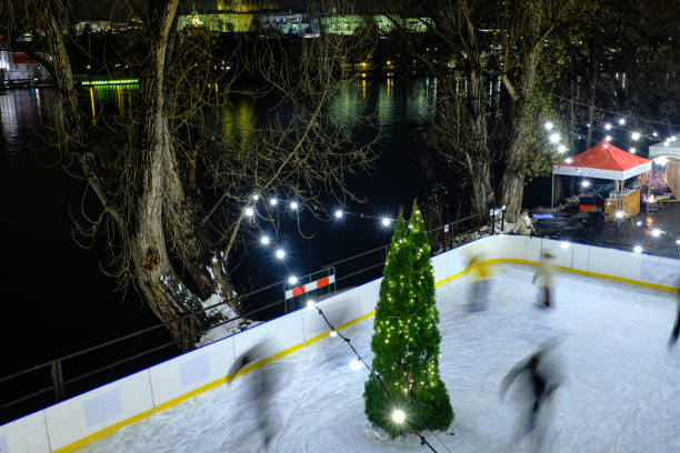 istock Outdoor ice skating on Vltava riverbank at night 1470046621