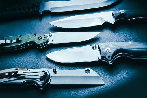 Row of every day carry knives.
