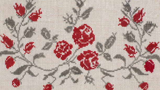 embroidery on an old linen towel with colored threads