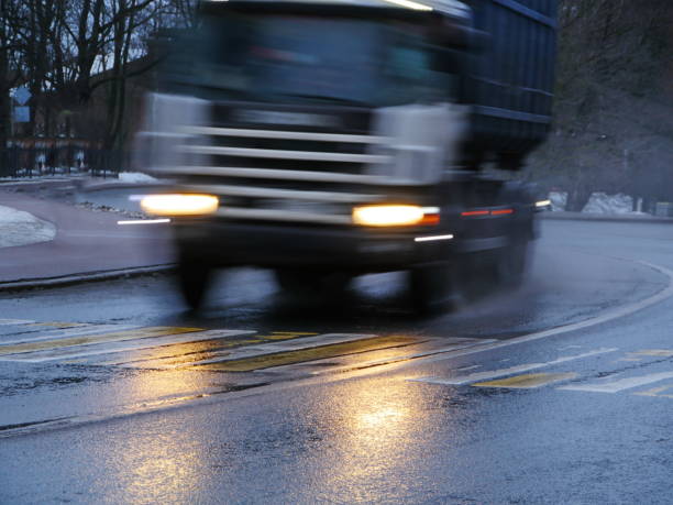 istock big truck speeding down the road 1470050130